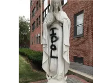 Statue of Mary outside Cathedral Prep School and Seminary, Queens, New York. 