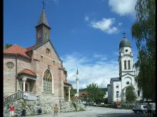 A Catholic parish, a mosque, and a Serbian Orthodox parish in Bosanska Krupa, Bosnia and Herzegovina. 