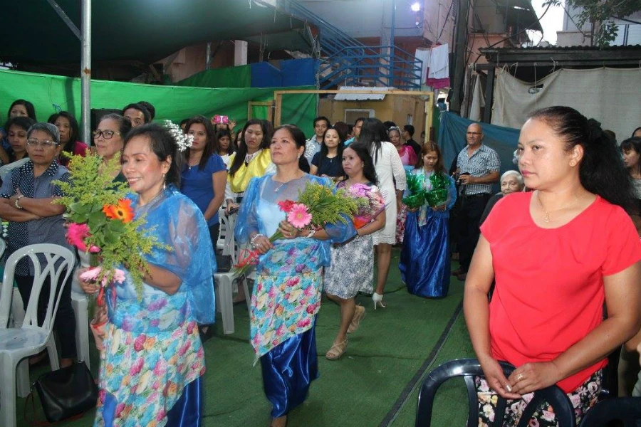 Catholic migrant workers from the Philippines attend Mass outside the Community of St. Therese of Lisieux chapel in Rehovot, Israel. ?w=200&h=150