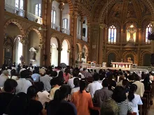 Catholics gathered at Bangkok's Assumption Cathedral for the Good Friday liturgy to pray for peace, April 18, 2014. 