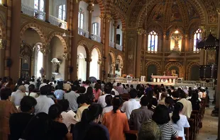 Thai Catholics pray for peace at Bangkok's Assumption Cathedral.   Antonio Anup Gonsalves/CNA.