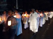 Catholics take part in a candle-lit procession at St. Mary's Catholic Church, Yangon, Myanmar. 