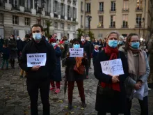 Catholics protest coronavirus restrictions under which public Masses are banned, Nov. 15, 2020, in Versailles. 