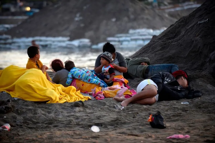 Central American migrants in a caravan headed toward the United States Jan. 21, 2010. ?w=200&h=150