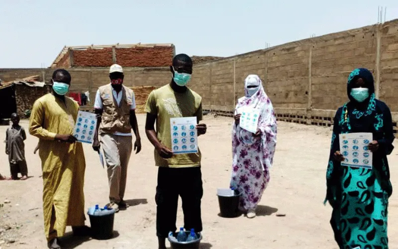 JRS teachers in Chad with some of the posters and information materials they are using to create awareness about COVID-19 among the refugee communities. ?w=200&h=150