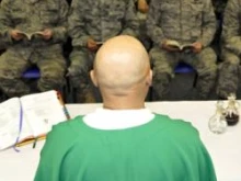 Chaplain (Maj.) Mike Martinez celebrates Mass for Arizona Air National Guardsmen. 