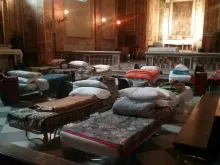 Cots set up for the homeless in the Roman parish of San Callisto, January 2017. 