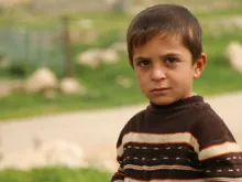  A young child at the Sharia Refugee Camp in Dohuk, Iraq. 