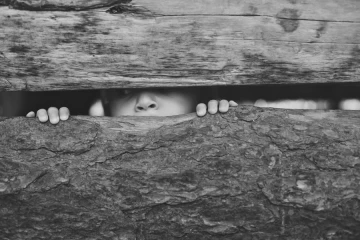Child peering through fence Immigration Credit Peter Kirkeskov Rasmussen via Flickr CC BY NC SA 20 CNA 5 28 15
