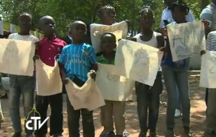 Children at the Saint Sauveur refugee camp in Bangui, Central African Republic, welcome Pope Francis, Nov. 29, 2015.   CTV.