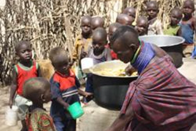 Children in Kenya wait in line for a meal Courtesy Marys Meals CNA World Catholic News 8 4 11
