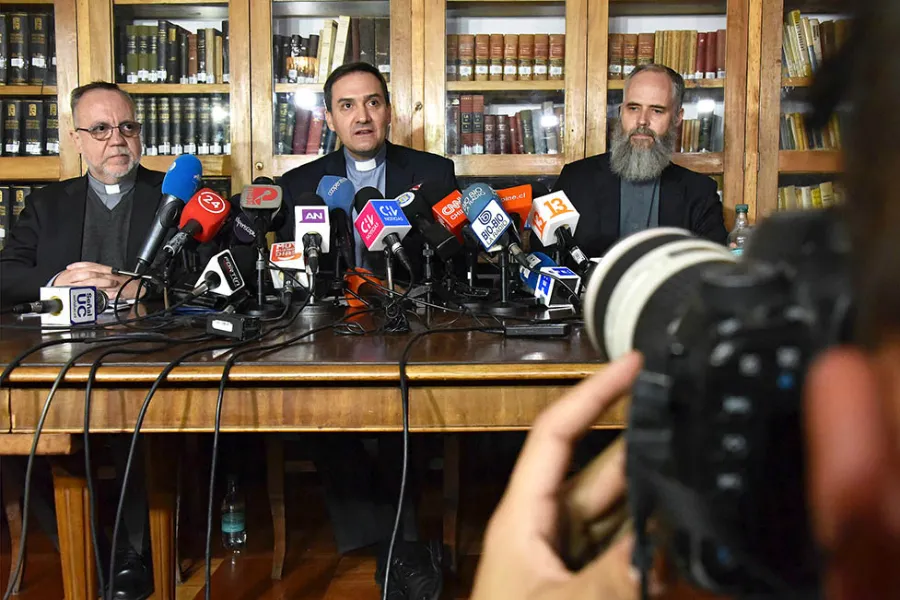 Fathers Eugenio de la Fuente Lora, Alejandro Vial Amunátegui, and Francisco Javier Astaburuaga Ossa speak at a press conference in Santiago de Chile, May 23, 2018. ?w=200&h=150