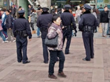Chinese Police patrol near People's Square in Shanghai, China. 