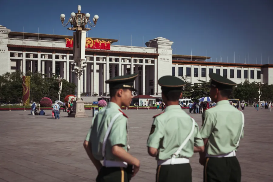 Officers patrol Tiananmen Square in Beijing, May 2013.?w=200&h=150