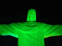 Christ the Redeemer statue lit up by green lights in Rio de Janerio, Brazil. ?w=200&h=150