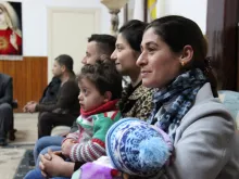 Syrian and Iraqi refugees at a church in Jordan. 