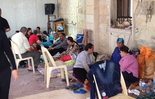 Christian refugees take refuge in Erbil, Iraq on August 9, 2014.   Fr. Firas Benham Benoka.