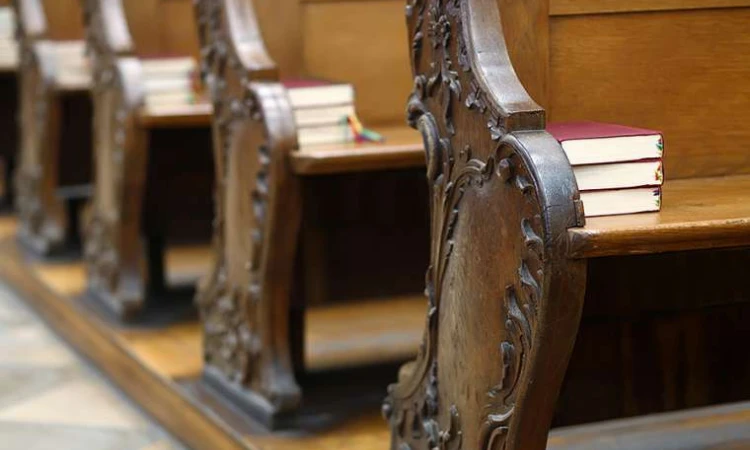 Church pews Credit Goran Bogicevic Shutterstock CNA 1