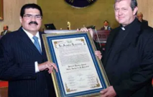 President of the Salvadoran General Assembly Ciro Cruz Zepedap and Monsignor Richard Antall pose with his award 