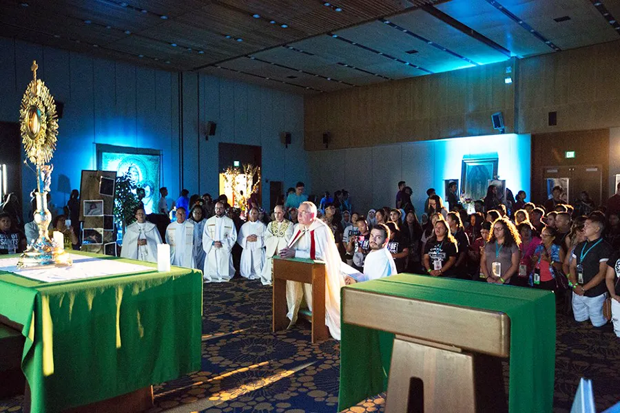 Archbishop Jose Gomez of Los Angeles leads Eucharistic adoration at the City of Saints conference, Aug. 6, 2017. Photo courtesy of the Archdiocese of Los Angeles. ?w=200&h=150