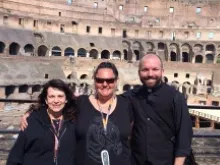 Clarissa Salazar (center) with Tanya Cangelosi and Fr. Michael O'Loughlin at the Colosseum. 