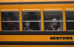 Children return to school Dec. 18, 2012 four days after the attack in Newtown, Conn. ?w=200&h=150