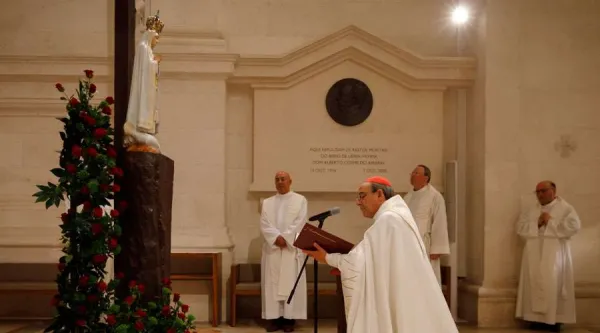 Cardinal Antonio Marto makes the consecration prayer before the Virgin of Fatima in Portugal. . Shrine of Our Lady of Fatima