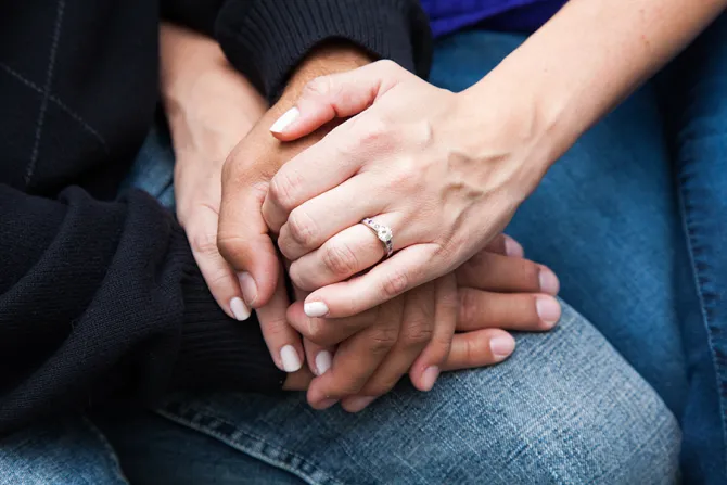 Couple holding hands Credit KSK Imaging Shutterstock CNA