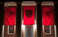 Crimson banners hang outside Memorial Church on the campus of Harvard University in Cambridge, Mass., Sept. 6, 2012. ?w=200&h=150