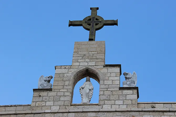 Cross at the top of the Seminary in Beit Jala Palestine Credit Aid to the Church in Need CNA 5 16 14