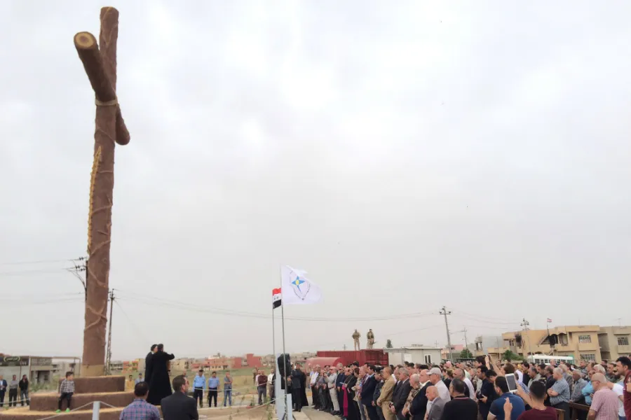 Syrian Catholic Archbishop Youhanna Boutros Moshe of Mosul blesses a newly-erected cross in Bakhdida, Iraq, May 2, 2017. Photo courtesy SOS Chretiens Orient.?w=200&h=150