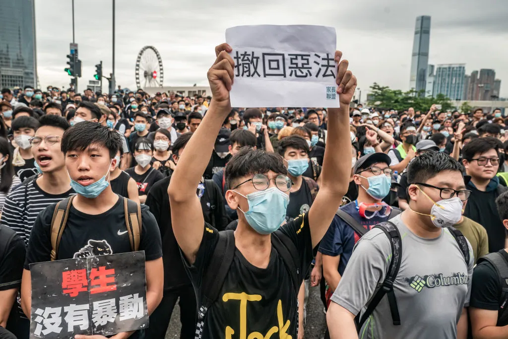 Crowds protest against the now-suspended China extradition bill in Hong Kong. ?w=200&h=150