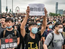 Crowds protest against the now-suspended China extradition bill in Hong Kong. 