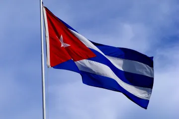 Cuban Flag Credit Steward Cutler via Flickr CC BY NC SA 20 CNA 5 11 15