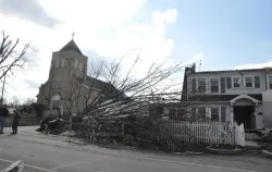 A downed tree outside of St. Francis Catholic Church in Henryville, Ind. ?w=200&h=150