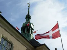 The Danish flag above a municipal administration building. 