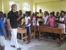 Deacon Patrick Moynihan speaks to students at the Louverture Cleary School in Haiti.