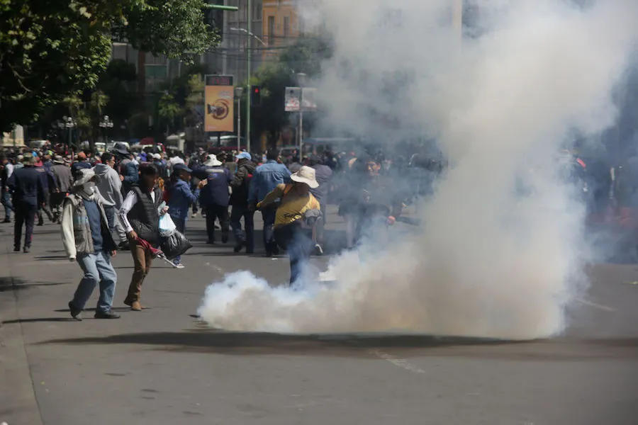 Demonstrators clash with police in La Paz, Bolivia Nov. 21, 2019. ?w=200&h=150