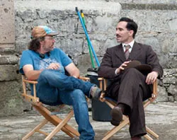 Director Dean Wright speaks to actor Nestor Carbonell on set. Courtesy of Pistache Media / Newland Films?w=200&h=150