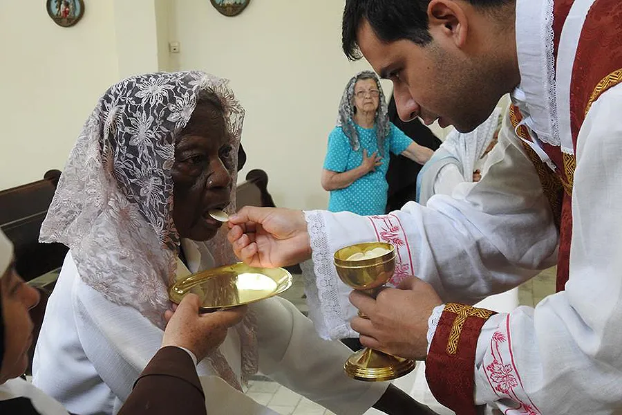 Dona Penha, 101, receives First Communion. ?w=200&h=150