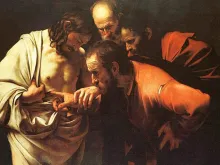 Thomas touches the wounds of the Risen Jesus. 