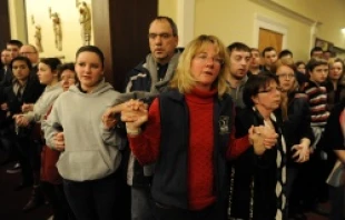 Mourners gather inside St. Rose of Lima Church at a vigil service for victims of the Sandy Hook School shooting Dec. 14, 2012 in Newtown, Conn. Andrew Gombert-Pool/Getty Images News