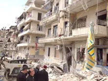 Archbishop Jean-Clement Jeanbart surveys damage from an attack on Christians in Aleppo, Syria, May 2015. 