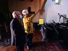 Archbishop Jose Gomez visits the scene of the fire at the San Gabriel mission, July 11, 2020. 