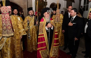 Ecumenical Patriarch Bartholomew exits the Patriarchal Church of St. George to greet Pope Francis.   GANP/Dimitrios Panagos.