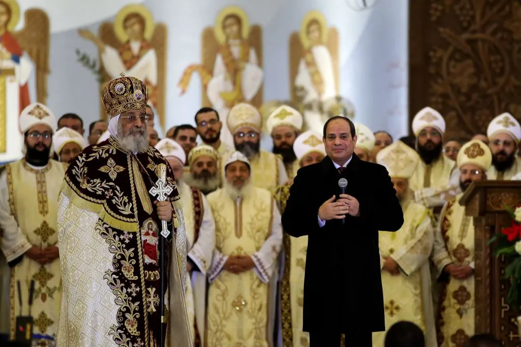 Egyptian President Abdel Fattah al-Sisi speaks near Tawadros II during a Liturgy at Nativity of Christ Cathedral in Egypt's administrative capital, Jan. 2, 2020. ?w=200&h=150