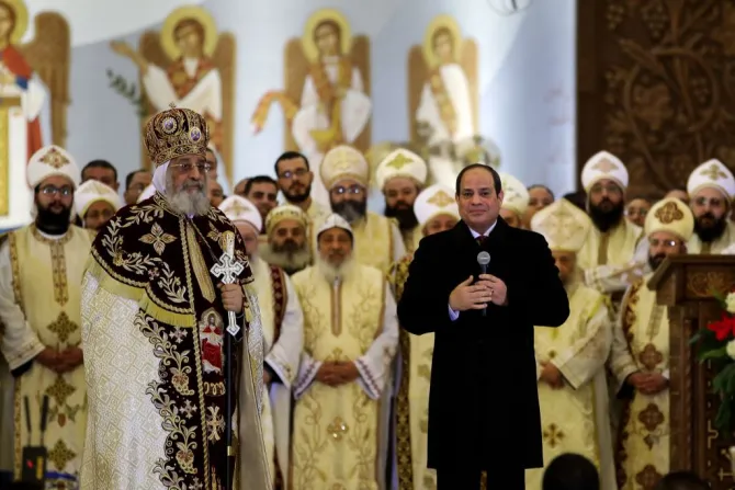 Egyptian President Abdel Fattah al Sisi speaks near Tawadros II during a Christmas Eve mass at Nativity of Christ Cathedral in Egypts admin capital Jan 6 2020 Credit STR AFP via Getty Imag