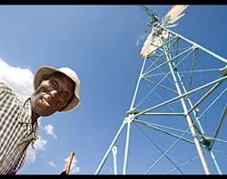 Ekiru Ewoi volunteers to help maintain a newly rehabilitated windmill / Photo by David Snyder for Catholic Relief Services?w=200&h=150