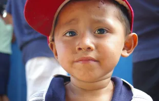 El Salvadoran boy.   Ian MacLellan/Shutterstock.
