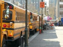 Empty buses lined up along a street in Philadelphia. 